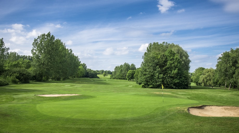 Abbey Hill Golf Centre, Buckinghamshire, UK - Golf course green with 2 bunkers
