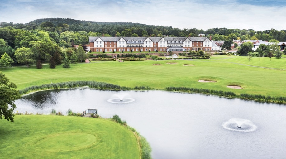 Carden Park Hotel & Golf Club, Cheshire - Golf Course clubhouse with greens, fairways and lake in front