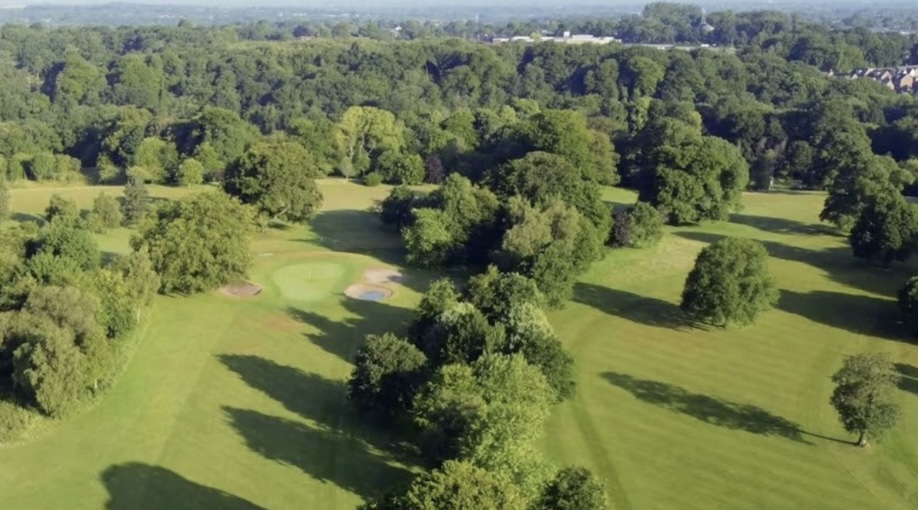 Duxbury Park Golf Club, Lancashire - Aerial view of golf course with tree lined fairways, greens and bunkers