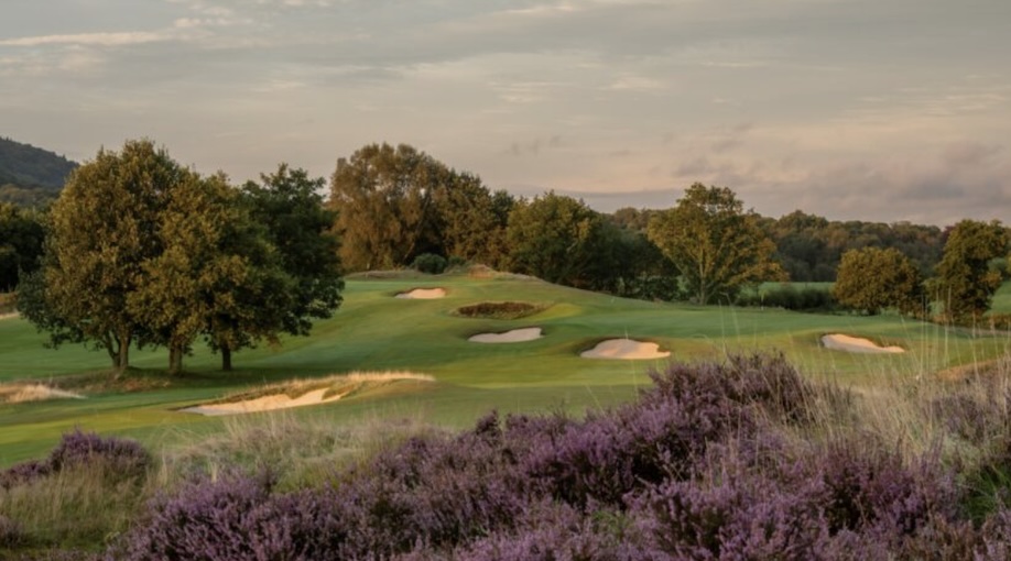 Pleasington Golf Club, Lancashire - view of rolling hill golf course from fairways with bunkers and trees and shrubs