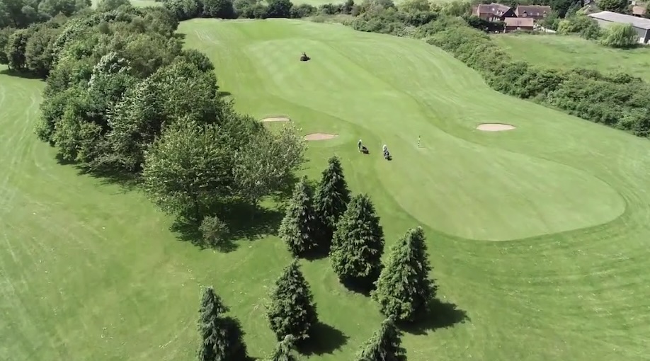 Ravenmeadow Golf Club, Worcestershire - aerial view of golf course green and tree lined fairways
