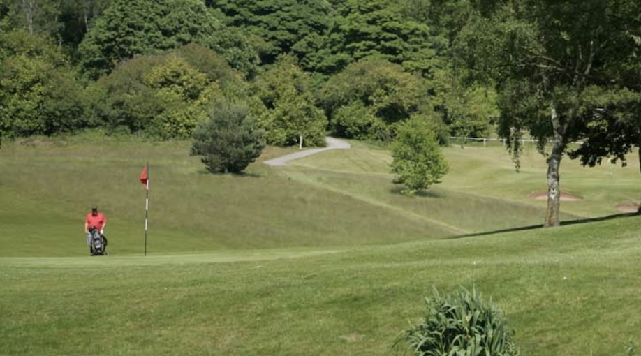 Rufford Park Golf & Country Club, Nottinghamshire - View of player on golf course green from fairway