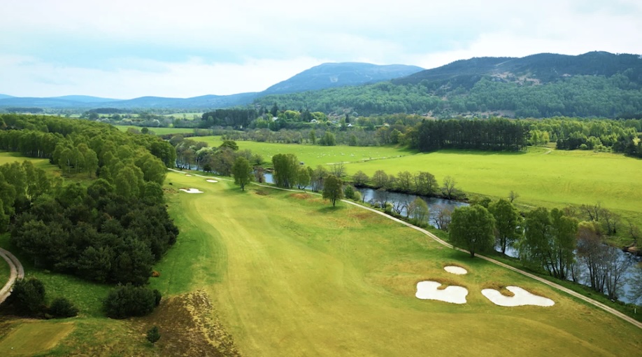 Spey Valley, Inverness, - Golf course view from a height with fairways, river and rolling hills and countryside