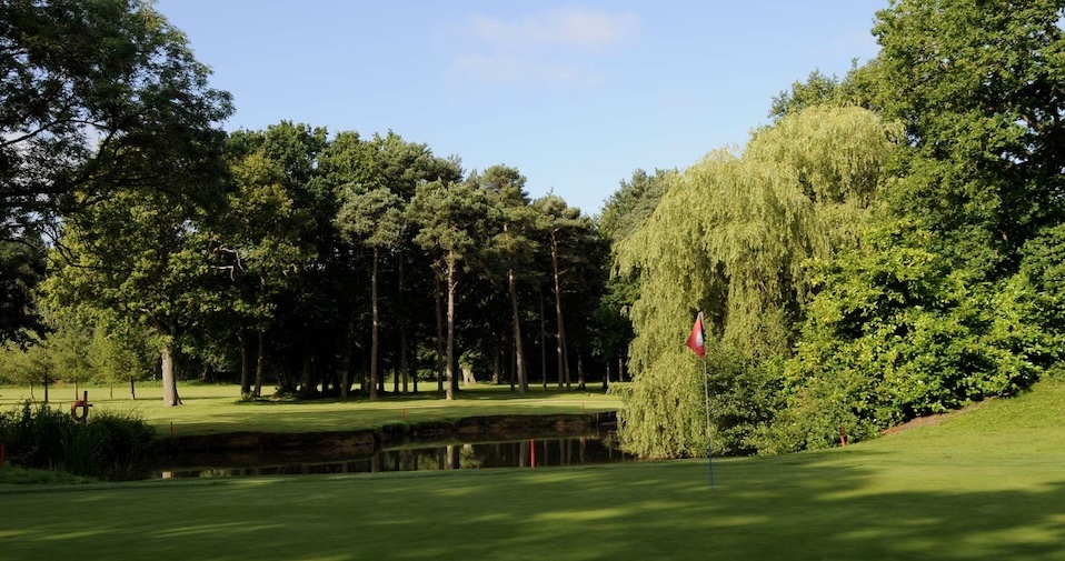 Golf Club England - St Ives (Hunts) Golf Club, Cambridgeshire,UK - Golf Vouchers St Ives (Hunts) Golf Club, Cambridgeshire - view of golf course from green looking across small lake to tree lined fairway