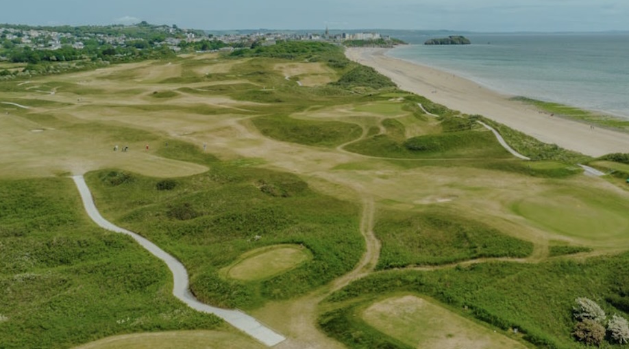 Tenby Golf Club Pembrokeshire-Aerial view of golf course with fairways and greens alongside coast