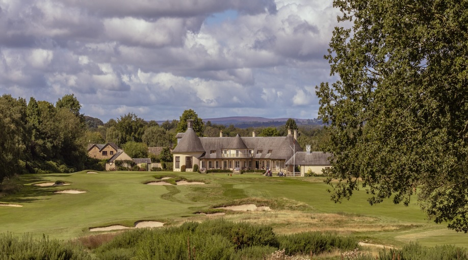 The Alwoodley Golf Club, West Yorkshire - landscape view of golf course looking back towards clubhouse across fairways, greens and bunkers
