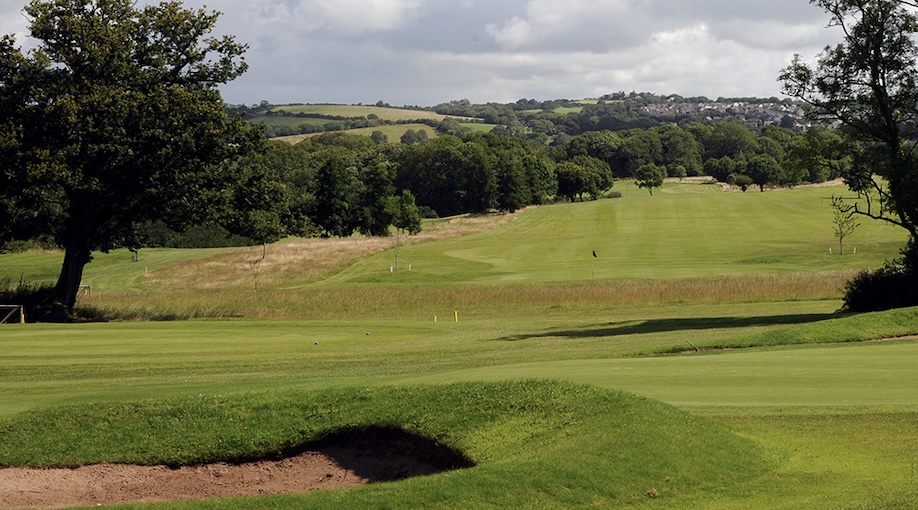 Trefloyne Golf Club Pembrokeshire - View of golf course down fairway, tress lining the distance and rolling countryside beyond